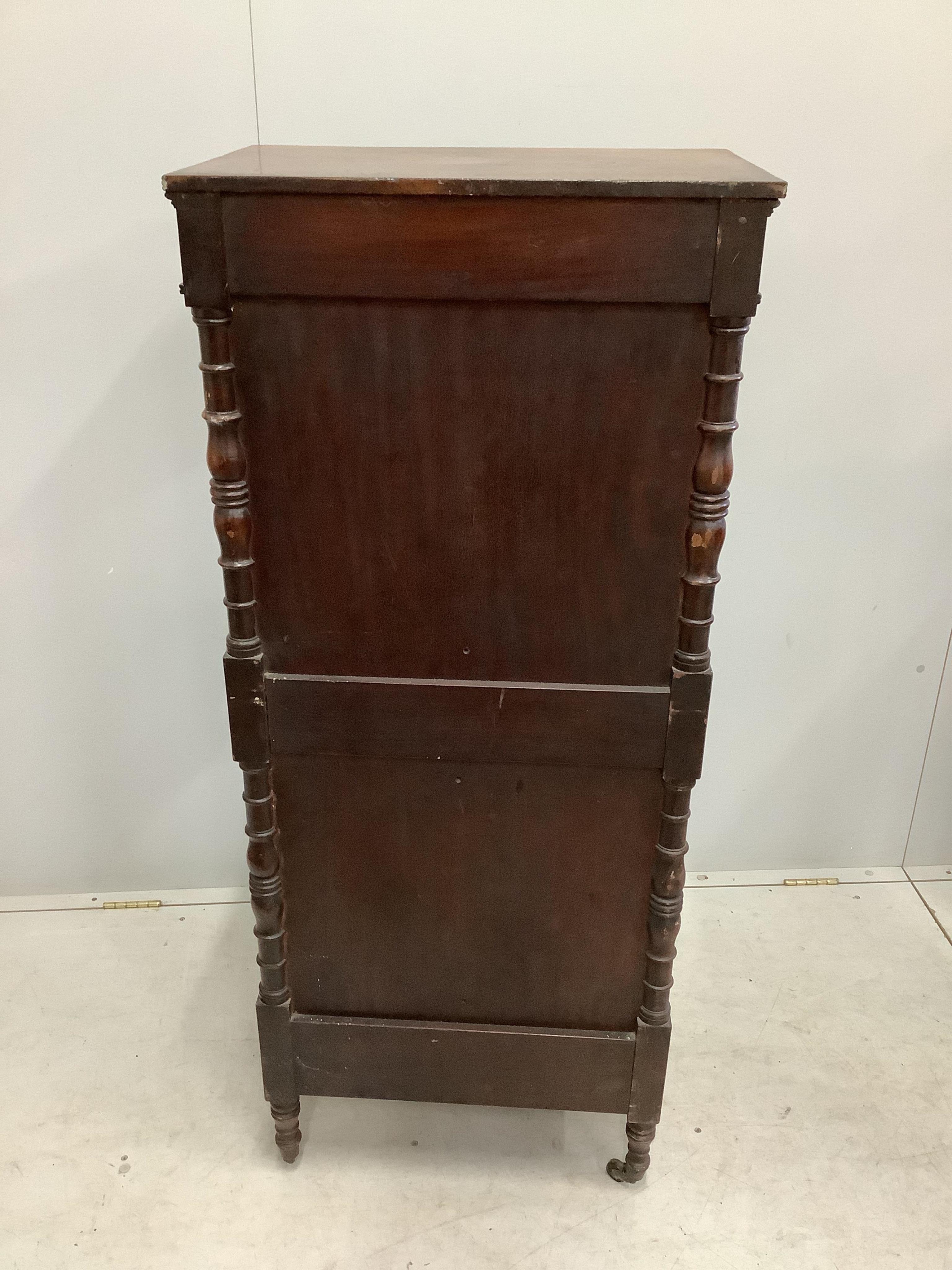 A Victorian mahogany three tier whatnot, width 57cm, depth 39cm, height 137cm. Condition - fair
